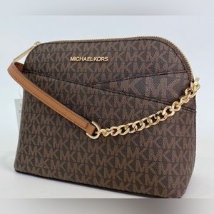 Michael Kors jet set travel medium logo dome crossbody bag.